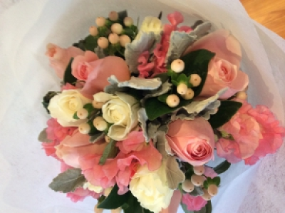 Perfect posy - Roses , sweet peas, Hypericum berry, dusty miller and assorted greenery arranged in a natural stem hand tied posy. Specific colours upon request. Flowers seasonal . Subject to availability.