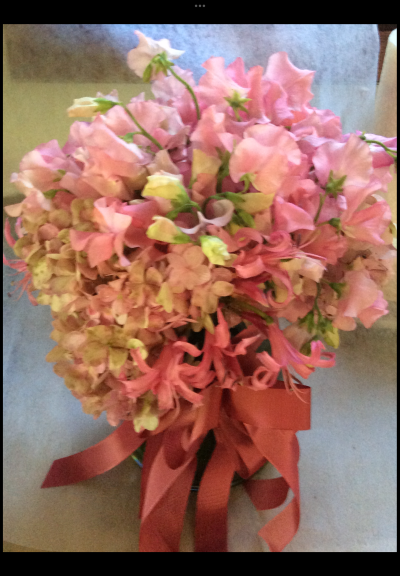 Simply Stunning - Simply stunning beautiful posy of sweet peas and hydrangeas arranged in a glass or ceramic vase. 
The vase optional and you can request either the sweet peas or hydrangeas on their own and colour choice optional at the customer’s request and availability of the highest quality flowers at the time of purchase.